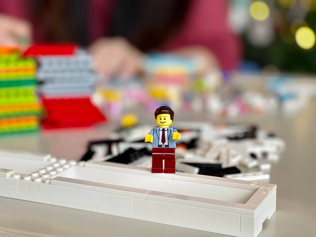 lego mini figure on white computer keyboard